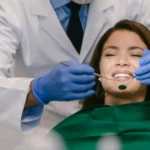 Patient receiving anxiety-free dental care in Tacoma with a dentist providing gentle treatment in a modern clinic