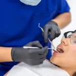 Dentist performing root canal in Tacoma on a patient at Davis Dental Group