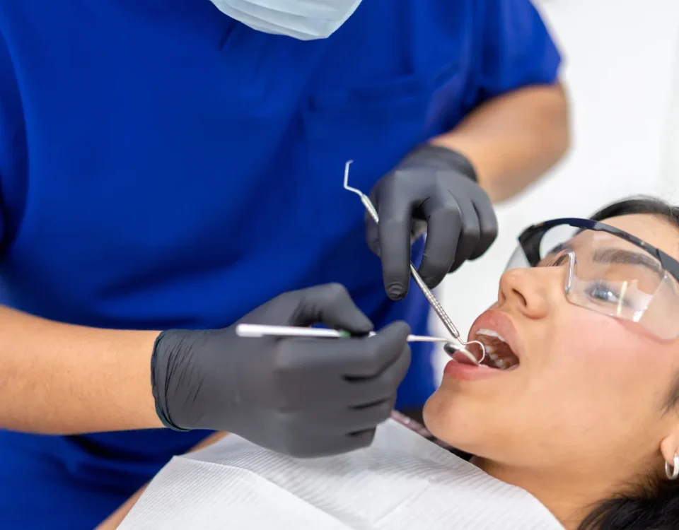 Dentist performing root canal in Tacoma on a patient at Davis Dental Group