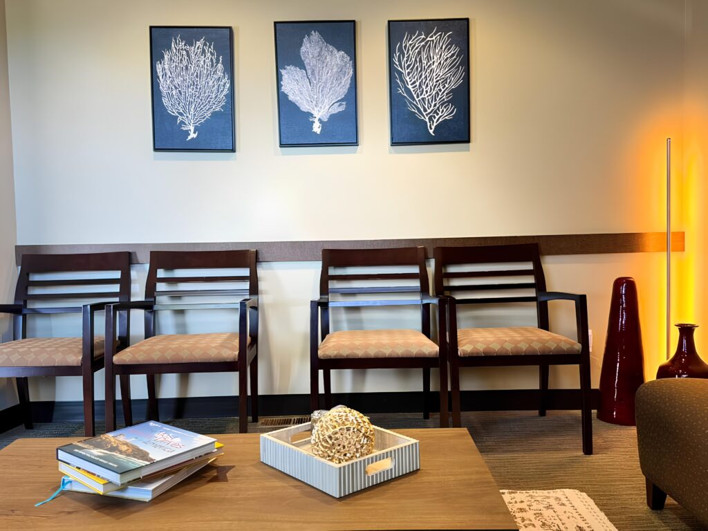 modern waiting area with chairs artwork and decorative accents